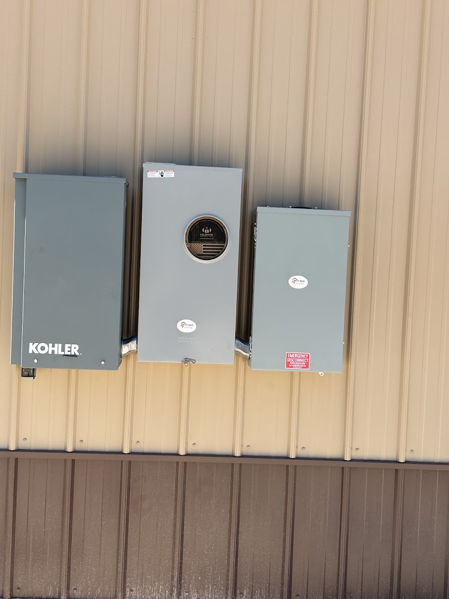 Whitehouse Electric LLC team member on site providing professional electrical service.